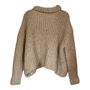 Zara’s Cozy Beige Knit Sweater